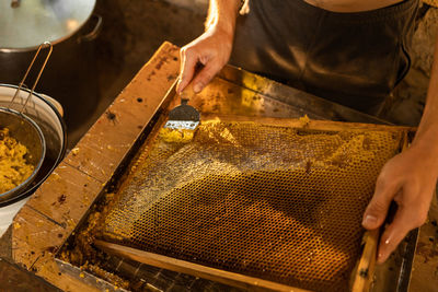 Cropped image of man preparing food