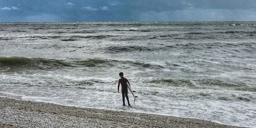 Silhouette of people on beach