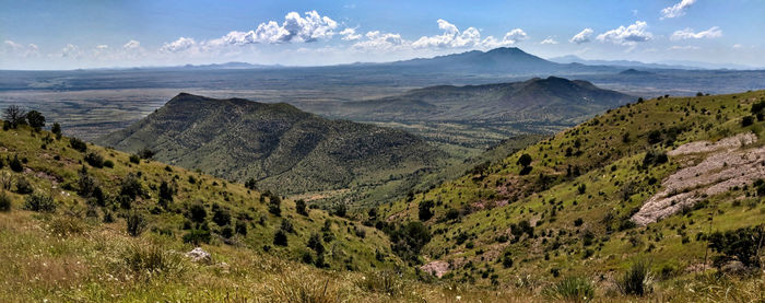 Panoramic view of landscape and mountains against sky