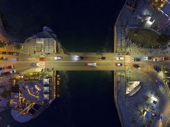 Cars against sky at night