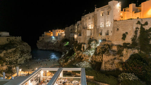 Buildings in city at night