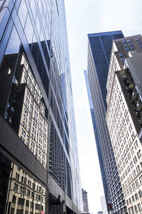 Low angle view of modern buildings against sky