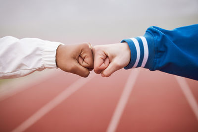 Cropped hand of man holding hands