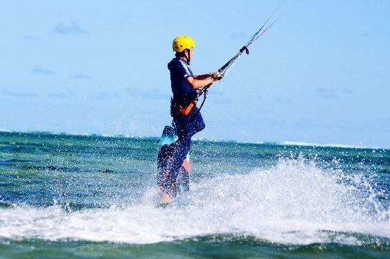 water, leisure activity, lifestyles, jumping, sea, full length, extreme sports, mid-air, enjoyment, motion, fun, vitality, vacations, sport, adventure, waterfront, skill, balance