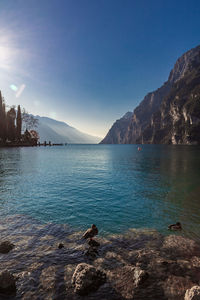 Scenic view of lake against blue sky