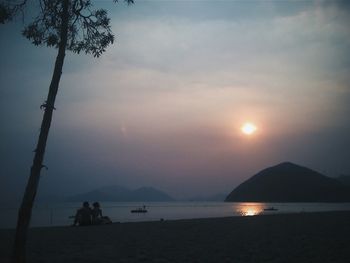 Scenic view of sea at sunset