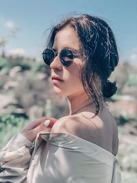 Portrait of woman wearing sunglasses