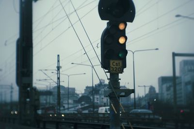 Close-up of road signal at dusk