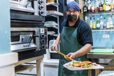 Man preparing food at restaurant