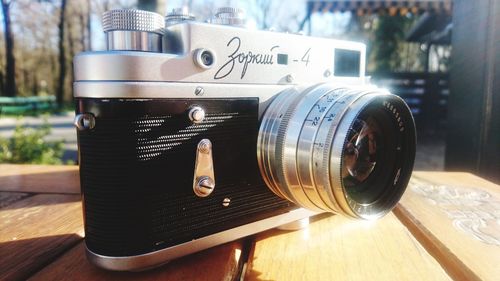 Close-up of camera on table