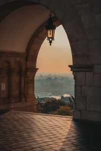 Buildings seen through arch bridge