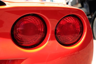 Close-up of red vintage car