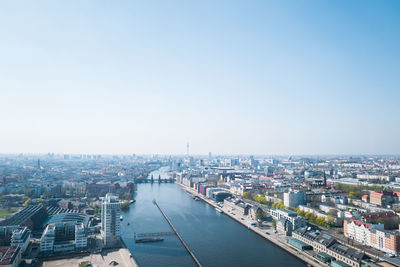 High angle view of river amidst buildings in city
