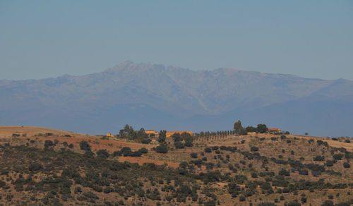 Scenic view of mountains against clear sky