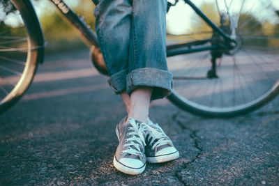 Low section of man riding bicycle