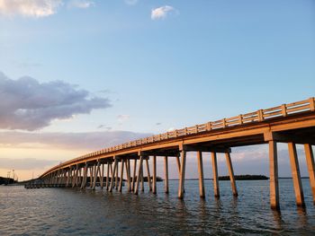 Pier over sea against sky