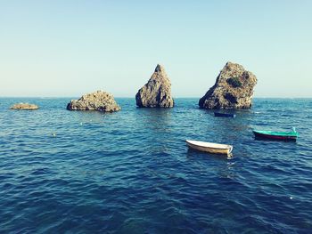 Panoramic view of sea against clear sky