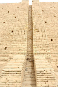 Low angle view of brick wall