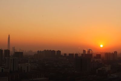 View of cityscape at sunset