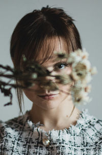 Close-up portrait of young woman