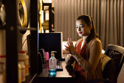 Woman working on table