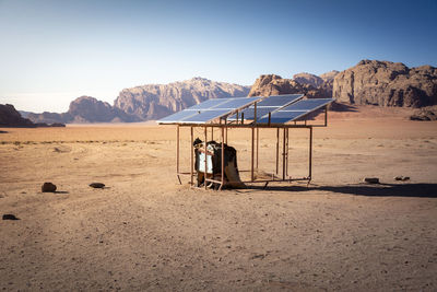 Scenic view of desert against clear sky