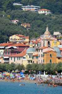 Group of people in front of buildings