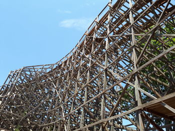 Low angle view of tower against blue sky