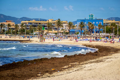 View of beach against blue sky