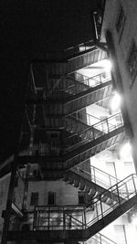 Low angle view of illuminated staircase at night