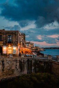Panoramic view of ortigia with fonte aretusa and lungomare alfeo  during sunset