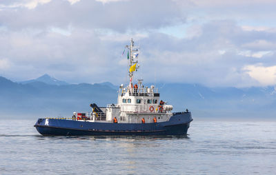 Ship in sea against sky