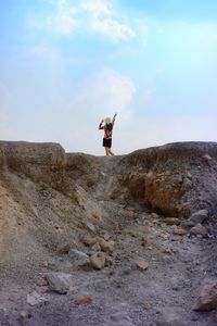 Man standing on rock