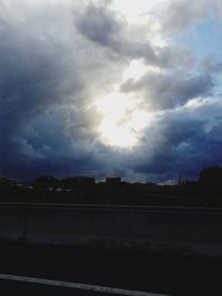 Road against cloudy sky