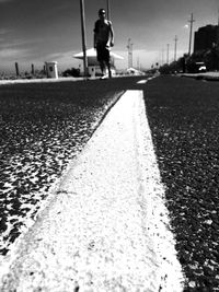 Man walking on road