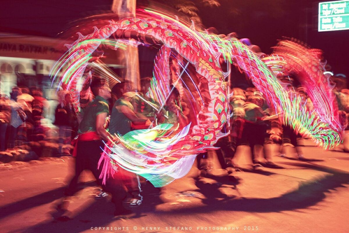 illuminated, art and craft, art, night, arts culture and entertainment, creativity, decoration, celebration, animal representation, multi colored, cultures, tradition, human representation, carousel, indoors, amusement park, sculpture, amusement park ride, incidental people