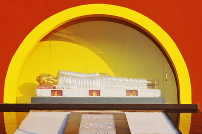 Low angle view of yellow entrance of building