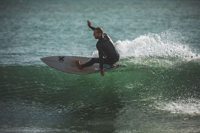 Man surfing in sea