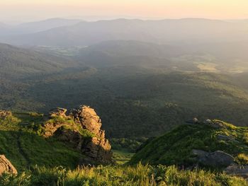 Landscape with mountain range in background