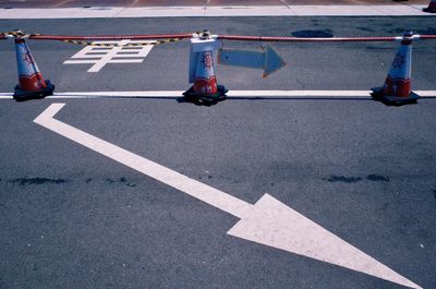 Arrow symbol on road in city