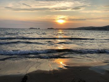 Scenic view of sea against sky during sunset