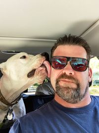 Portrait of man with dog