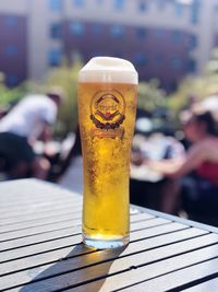 Close-up of beer glass on table