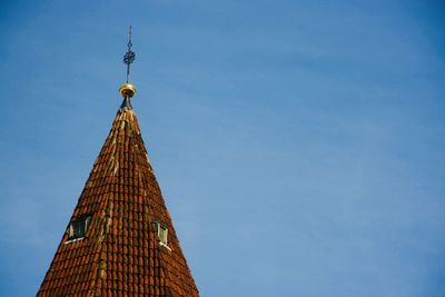 Low angle view of a building against blue sky