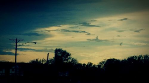 Scenic view of landscape against sky at sunset