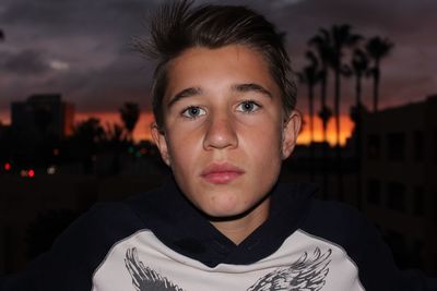 Portrait of beautiful woman against sky