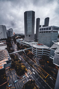High angle view of buildings in city against sky