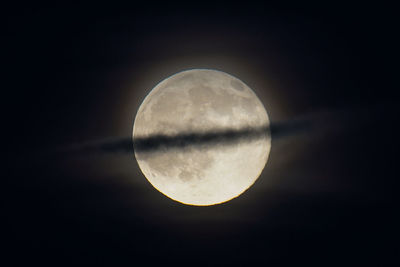 Low angle view of moon against sky at night