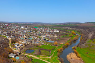 Rustic panorama view from above . aerial view of riverside village