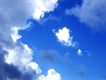 Low angle view of clouds in blue sky